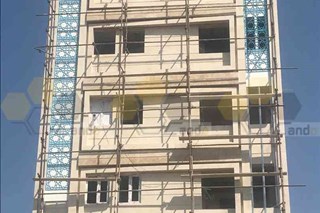 سمنت برد با طرح اسلیمی در ساختمان